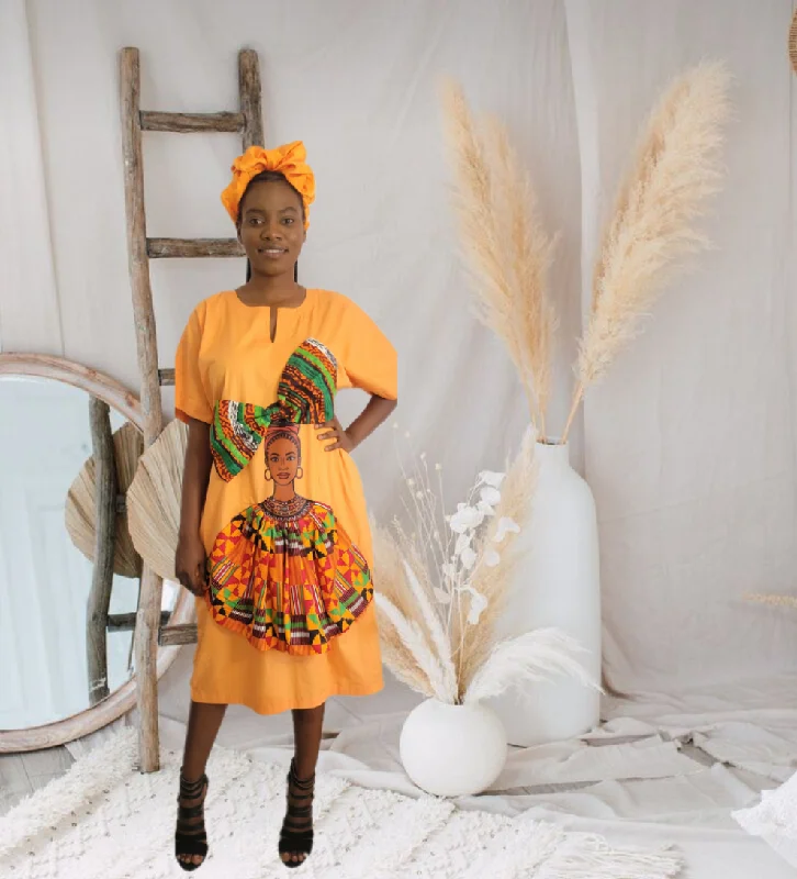 The Ngozi Melanin Woman Face Print With African Print Ankara Headwrap Dress in Orange by Eldimaa Fashion The Ngozi Melanin Woman Face Print With African Print Ankara Headwrap Dress in Orange by Eldimaa Fashion